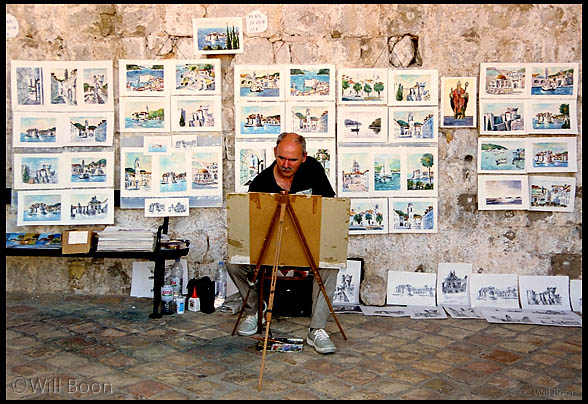 Artist painting watercolours inside the old town, Dubrovnik
