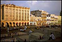 Busy havana street life as seen from the steps of el capitolo