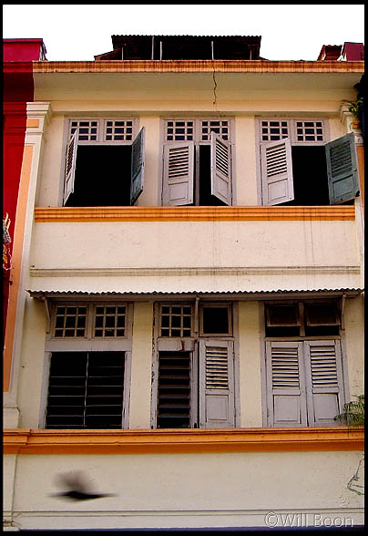 The veneer shutters of an old Chinese house, Singapore