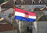 Croatian flag flies above Dubrovnik