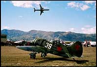 Polikarpov I-16 with a New Zealand Air Force B757 circling