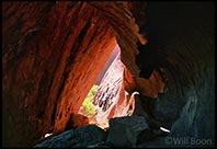 An eroded rock cave seen at Uluru, Red Center, Australia