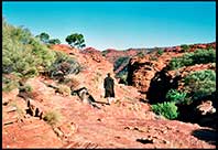 Bush guide wanders through the canyon landscape, Kings Canyon, Australia